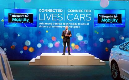Steve Odell, executive vice president and president of Europe, Middle East and Africa, Ford Motor Company, speaks at Mobile World Congress in Barcelona on February 24, 2014