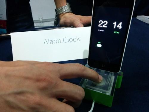 Acoustruments, developed by Disney and Carnegie Mellon University (CMU), are plastic add-ons that use ultrasound signals emitted from the speaker of a phone and picked up by its microphone. This example at CHI 2015 in Seoul controls an alarm clock app. 