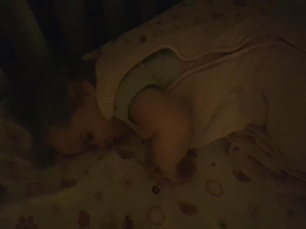 This sleeping bub was in a VERY dark room.