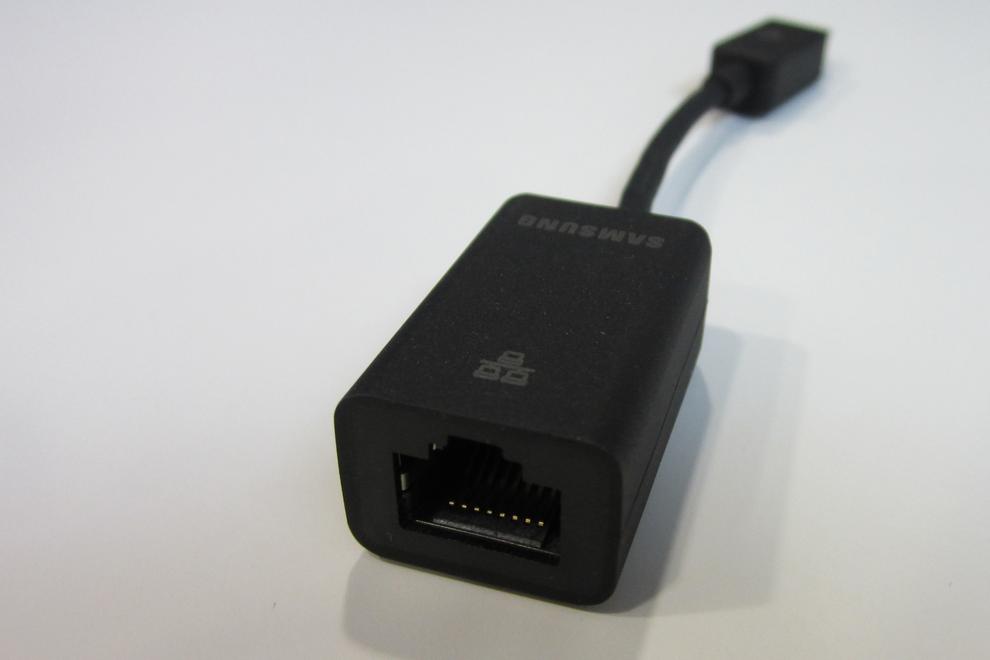 There's no onboard Ethernet, but you do get an adapter in the box.