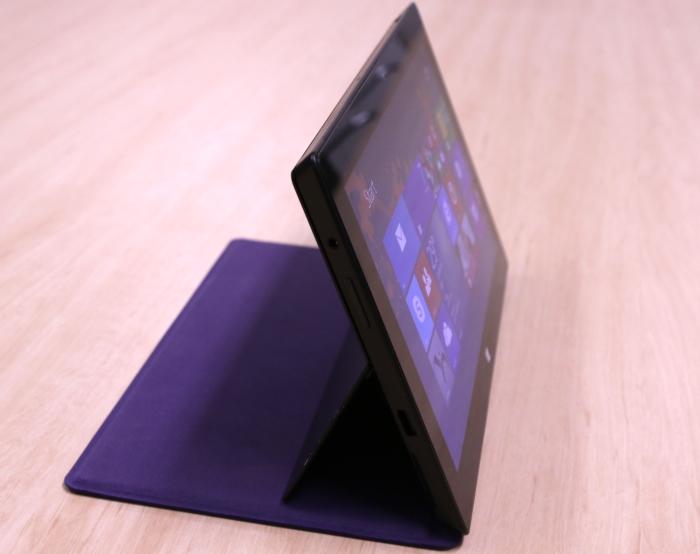You can fold the Type Cover 2 underneath the tablet so that it acts as a stand. 